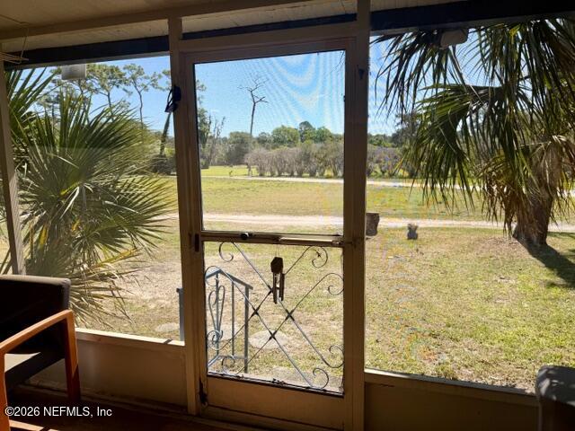 126 Golf Course Lane Crescent City, FL 32112 - Photo 8 of 23 a view of a ocean from a window