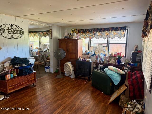 126 Golf Course Lane Crescent City, FL 32112 - Photo 10 of 23 a living room with furniture and a window