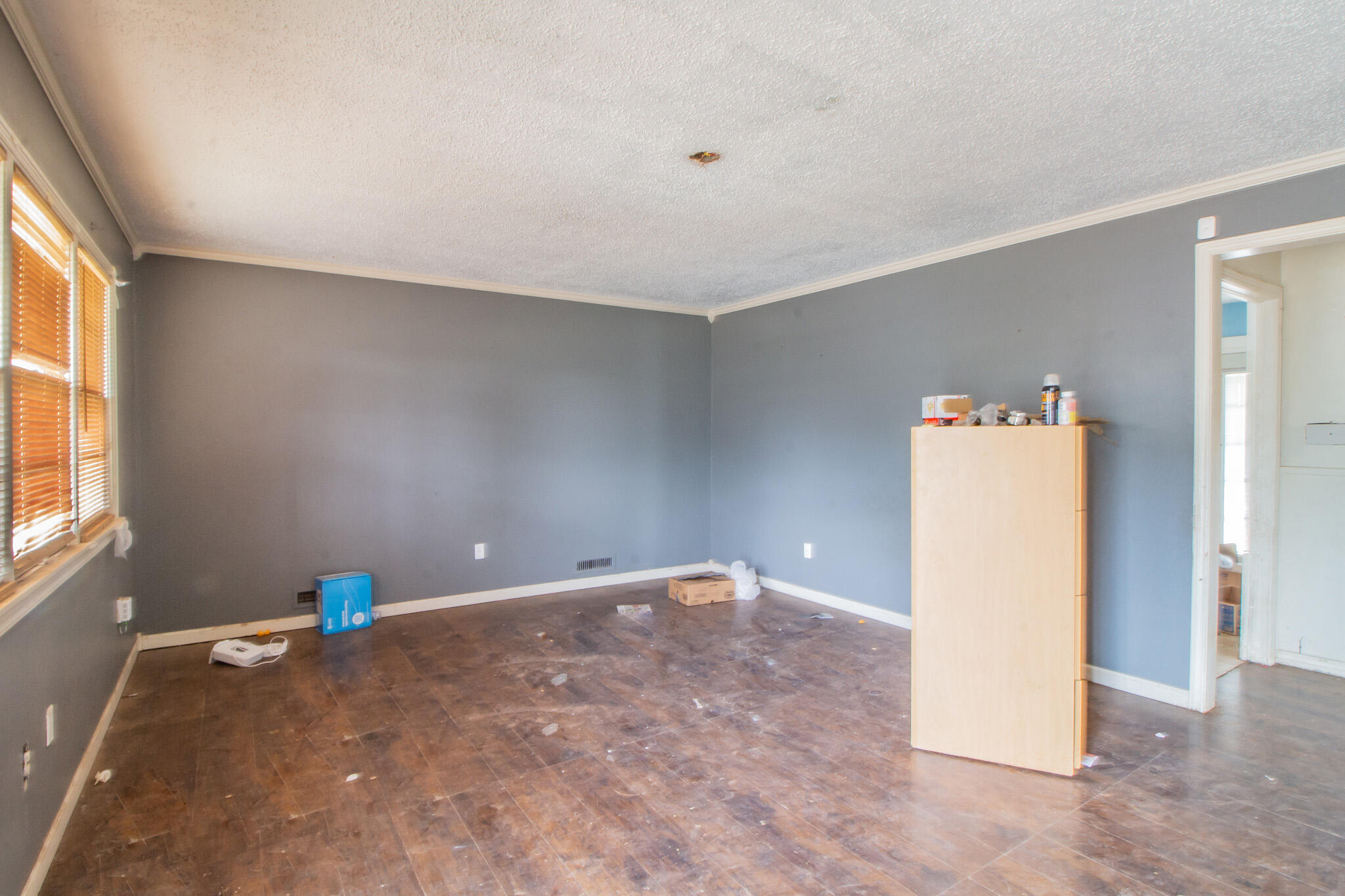 1606 60th Street Lubbock, TX 79412 - Photo 2 of 12 a view of a room with a refrigerator and washer