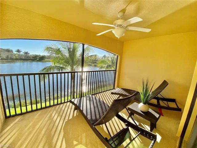 a view of a balcony with wooden floor
