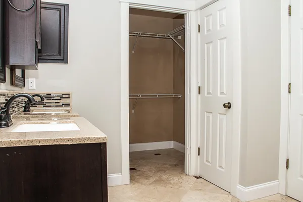a bathroom with a shower and toilet