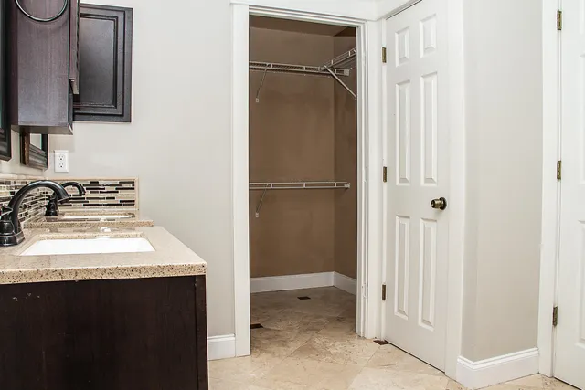 a bathroom with a shower and toilet