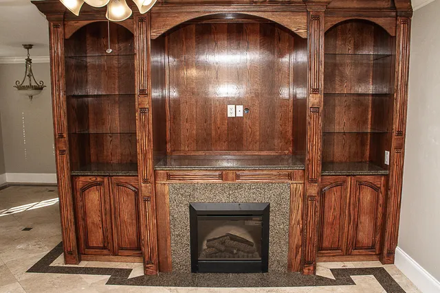 a kitchen with a fireplace