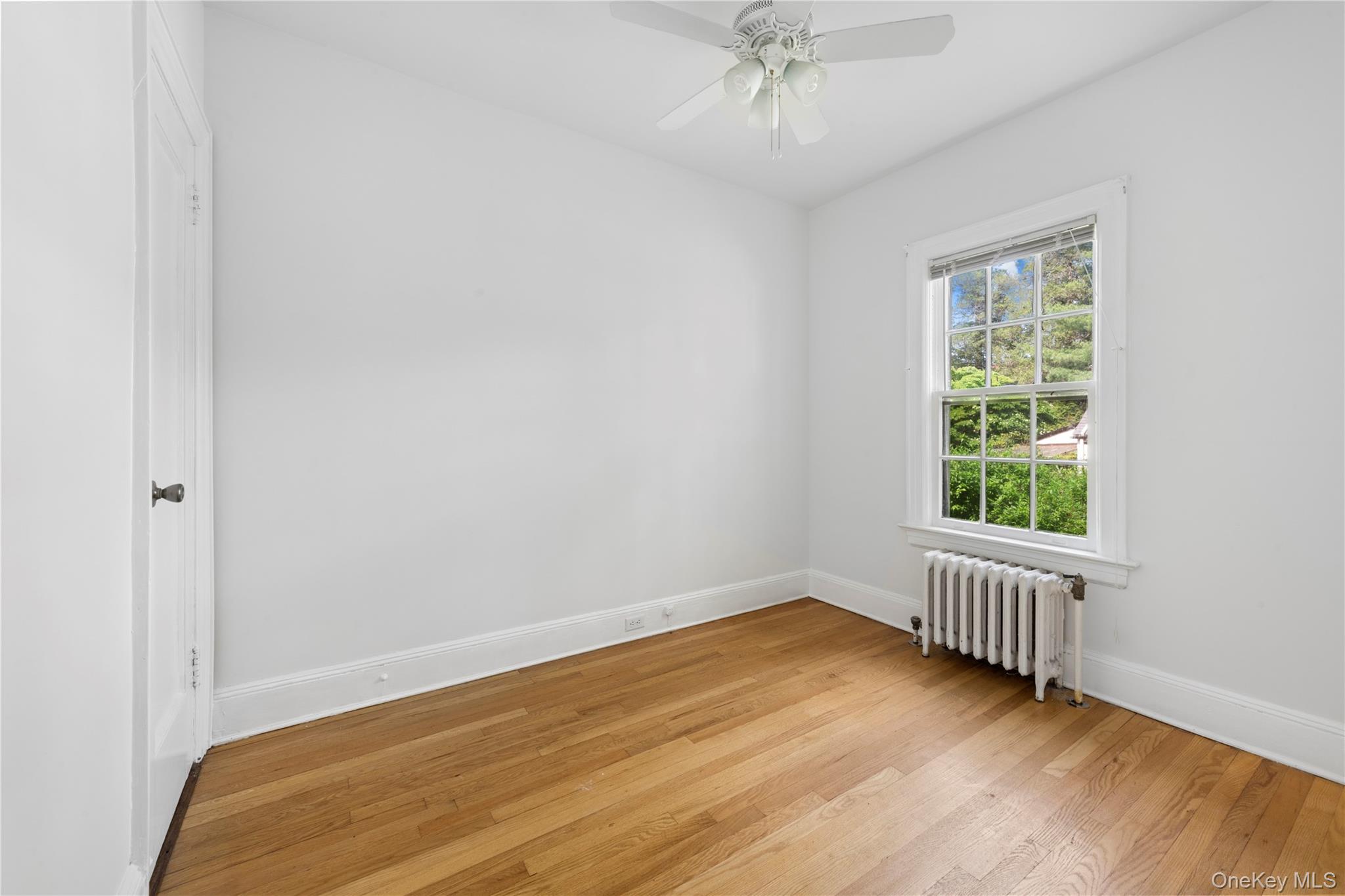 17 Old Orchard Road New Rochelle, NY 10804 - Photo 24 of 32 a view of an empty room with a window