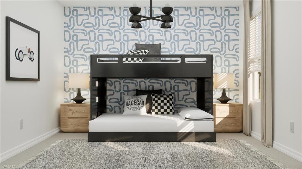 14895 Bluewater Road Babcock Ranch, FL 33982 - Photo 21 of 27 a bedroom with a bed and a fireplace