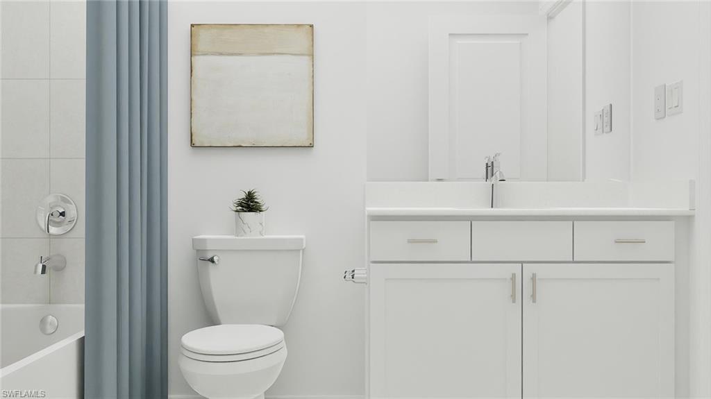 14895 Bluewater Road Babcock Ranch, FL 33982 - Photo 24 of 27 a bathroom with a sink a toilet and shower