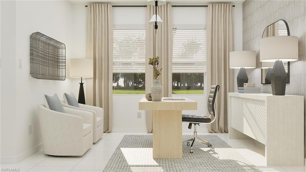 14895 Bluewater Road Babcock Ranch, FL 33982 - Photo 9 of 27 a living room with furniture and a floor to ceiling window