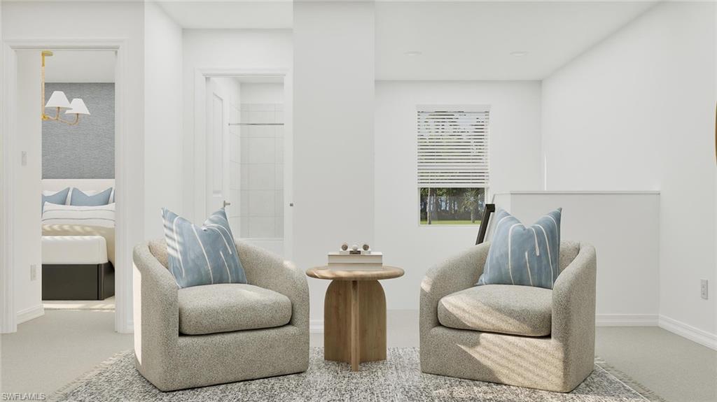 14895 Bluewater Road Babcock Ranch, FL 33982 - Photo 10 of 27 a living room with furniture and a fireplace