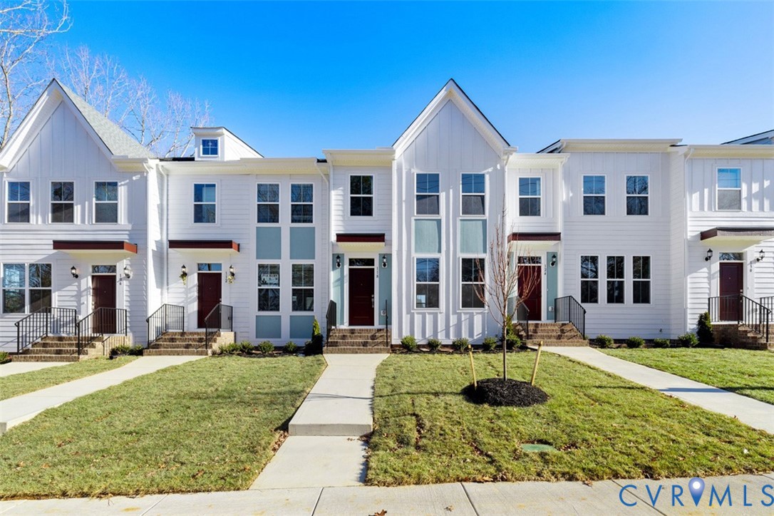 212 That Way Midlothian, VA 23114 - Photo 1 of 37 a front view of a house with a yard