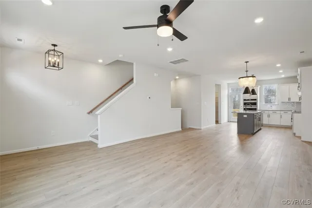 a view of kitchen with cabinets and stainless steel appliances