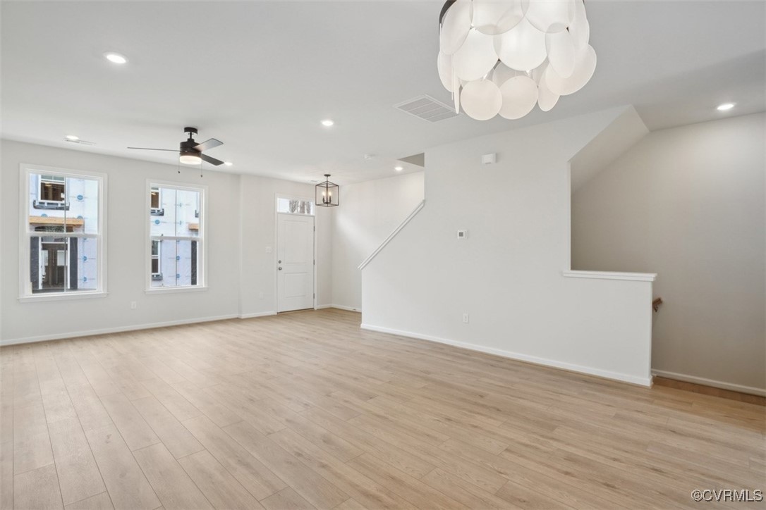 212 That Way Midlothian, VA 23114 - Photo 12 of 37 an empty room with wooden floor and windows