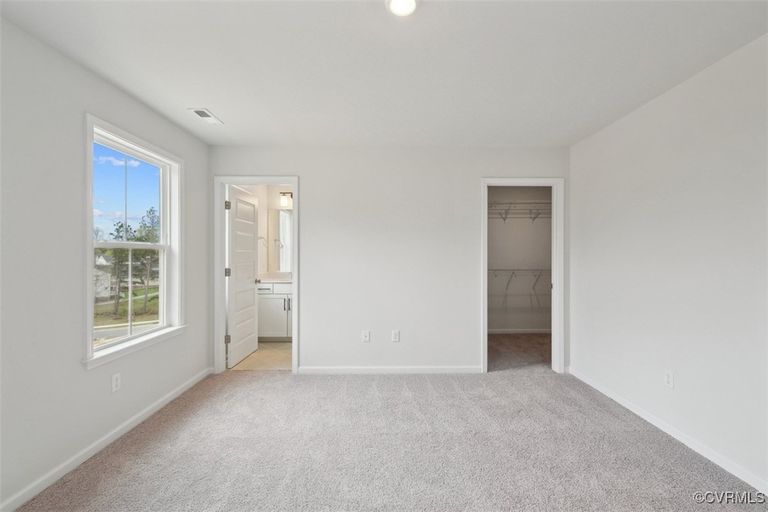 212 That Way Midlothian, VA 23114 - Photo 19 of 37 an empty room with windows and closet