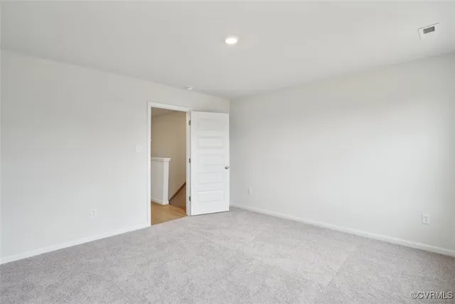 a bathroom with a sink toilet vanity and shower
