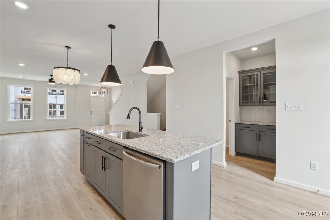212 That Way Midlothian, VA 23114 - Photo 5 of 37 a kitchen with stainless steel appliances granite countertop a sink stove and refrigerator
