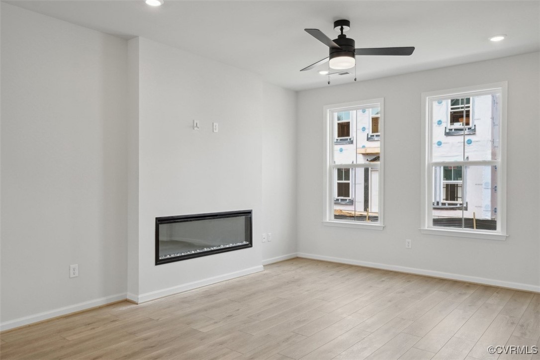212 That Way Midlothian, VA 23114 - Photo 9 of 37 a view of an empty room with a window and wooden floor