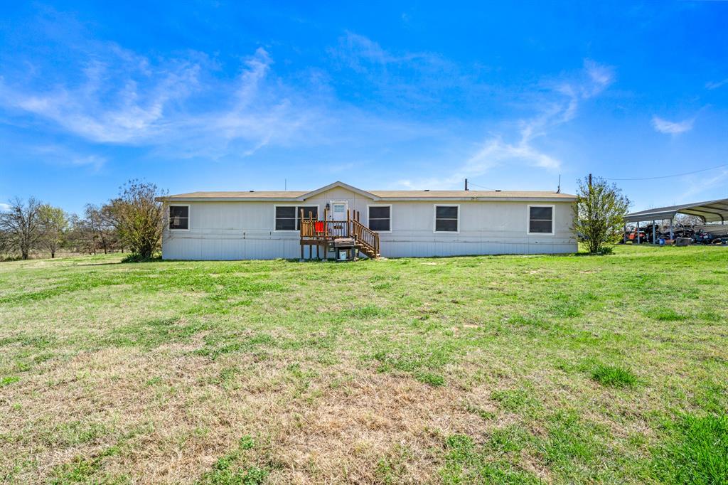 1536 New Hope Road Boyd, TX 76023 - Photo 12 of 40 a view of a house with a big yard