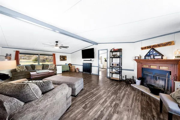 a kitchen with stainless steel appliances granite countertop a refrigerator sink and cabinets