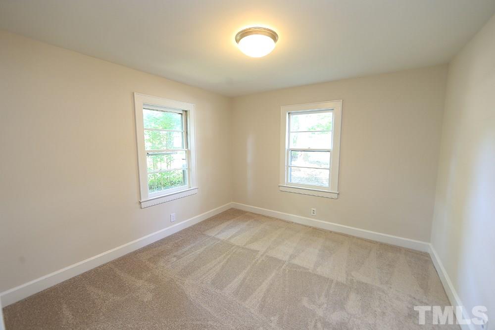 3644 Guess Road Durham, NC 27705 - Photo 8 of 14 This second bedroom sports new carpet and is nearly as large (12x11) as the adjacent master.