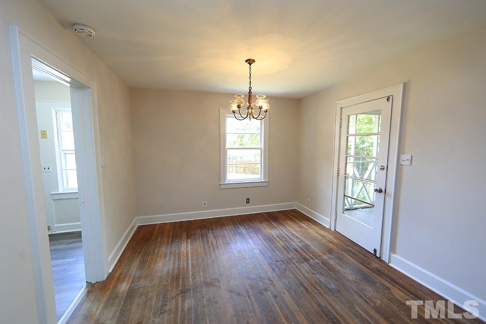 3644 Guess Road Durham, NC 27705 - Photo 10 of 14 The dining area is close to the kitchen and provides convenient access to the screened porch.