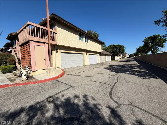 a view of a house with a street