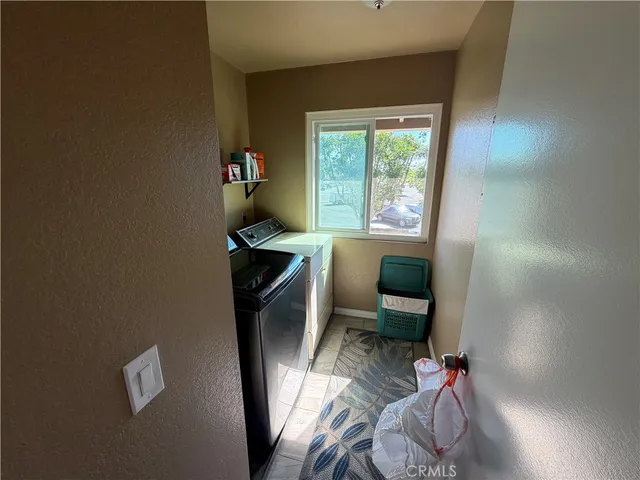 a workspace with furniture and a window