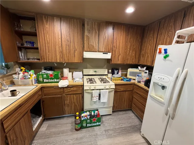 a kitchen with sink cabinets and window