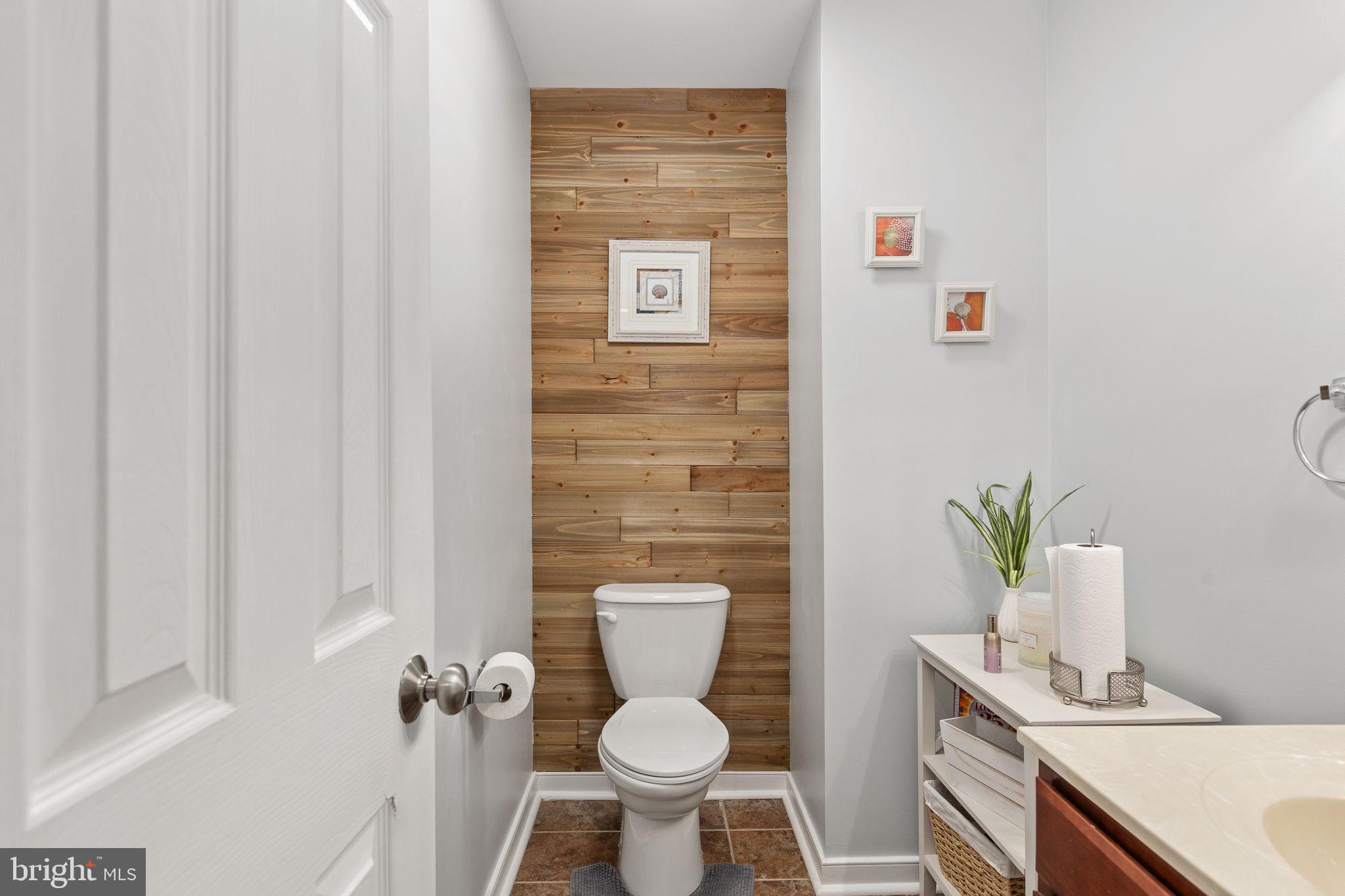22088 Landora Bridge Road Ruther Glen, VA 22546 - Photo 35 of 122 Charming half-bath with wood accents.