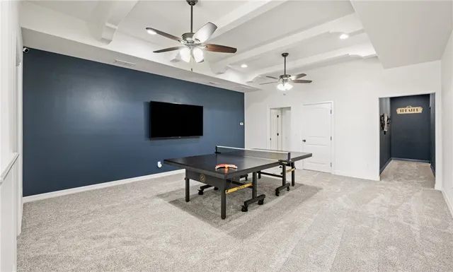 a view of a lake with a house in the background