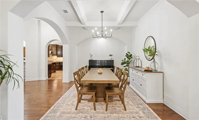 a large kitchen with stainless steel appliances granite countertop a stove and a sink