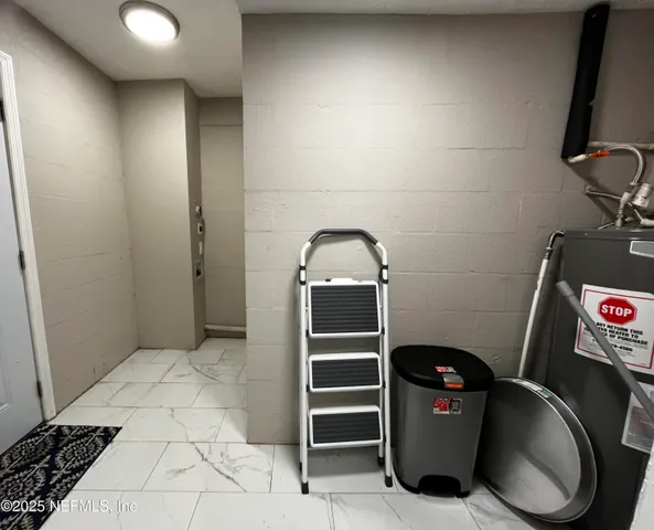 a view of storage and utility room