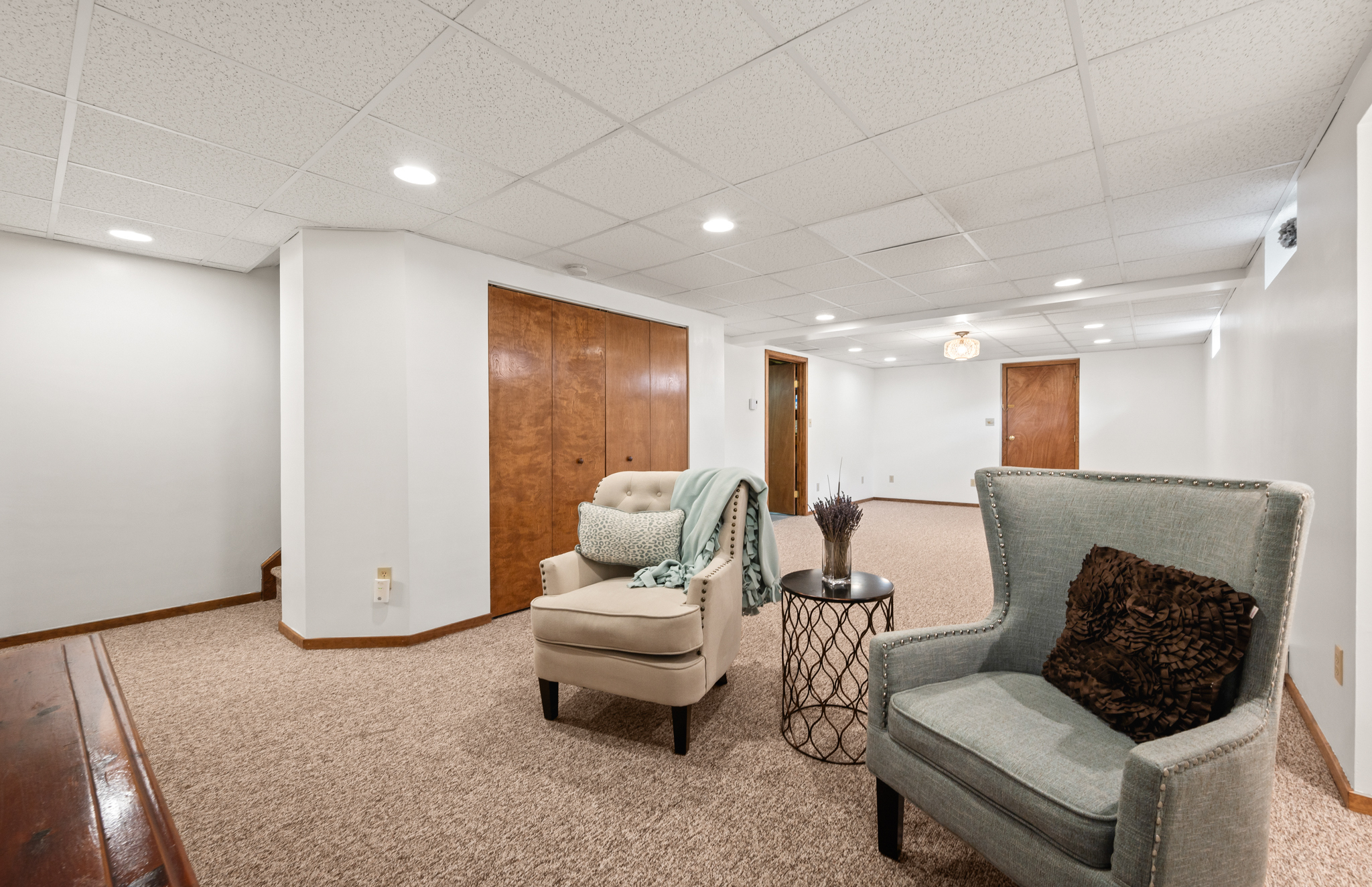 14 Inwood Lane Bristol, CT 06010 - Photo 24 of 40 a living room with furniture and a white wall