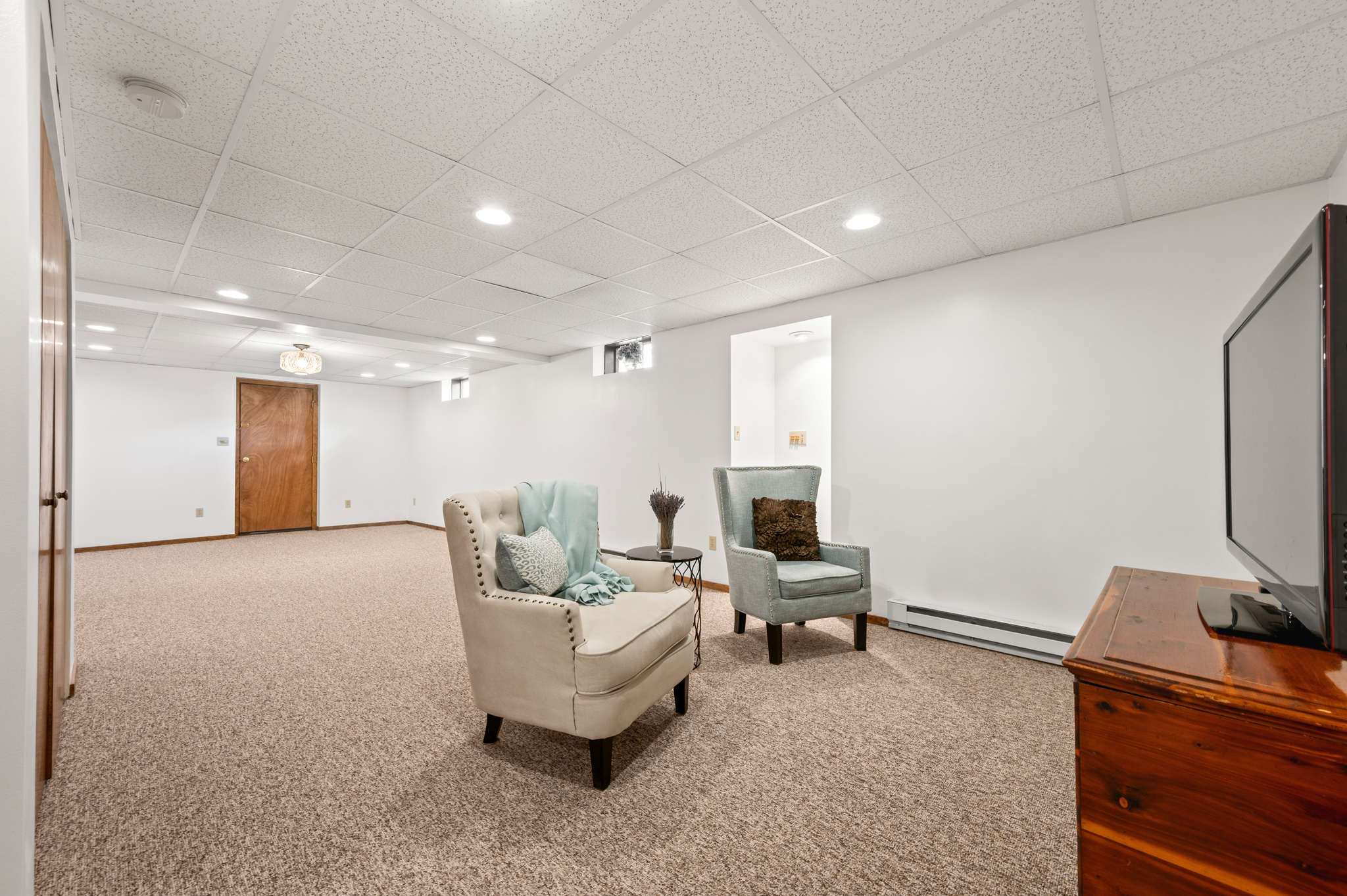14 Inwood Lane Bristol, CT 06010 - Photo 25 of 40 a living room with furniture and a flat screen tv