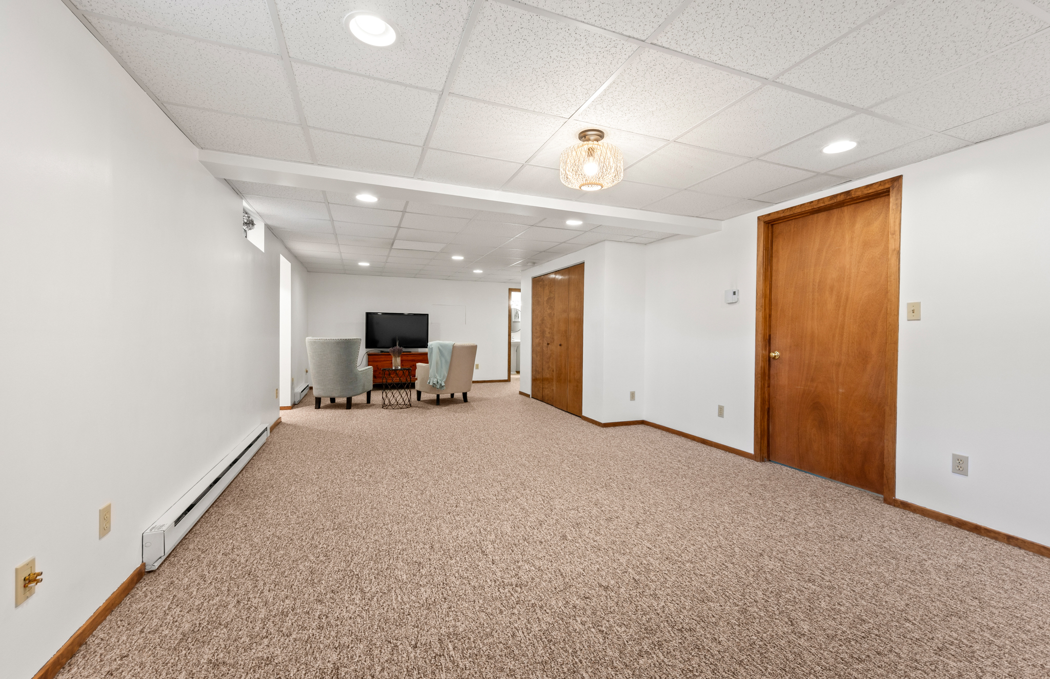 14 Inwood Lane Bristol, CT 06010 - Photo 26 of 40 a view of a livingroom with a staircase