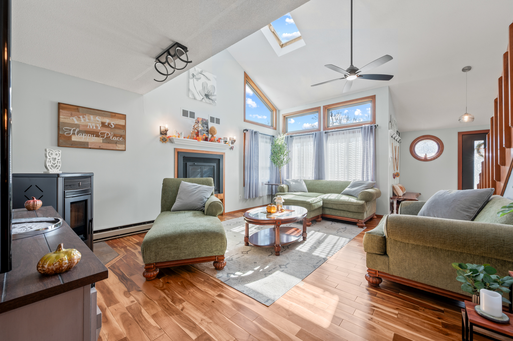 14 Inwood Lane Bristol, CT 06010 - Photo 3 of 40 a living room with furniture a fireplace and a window