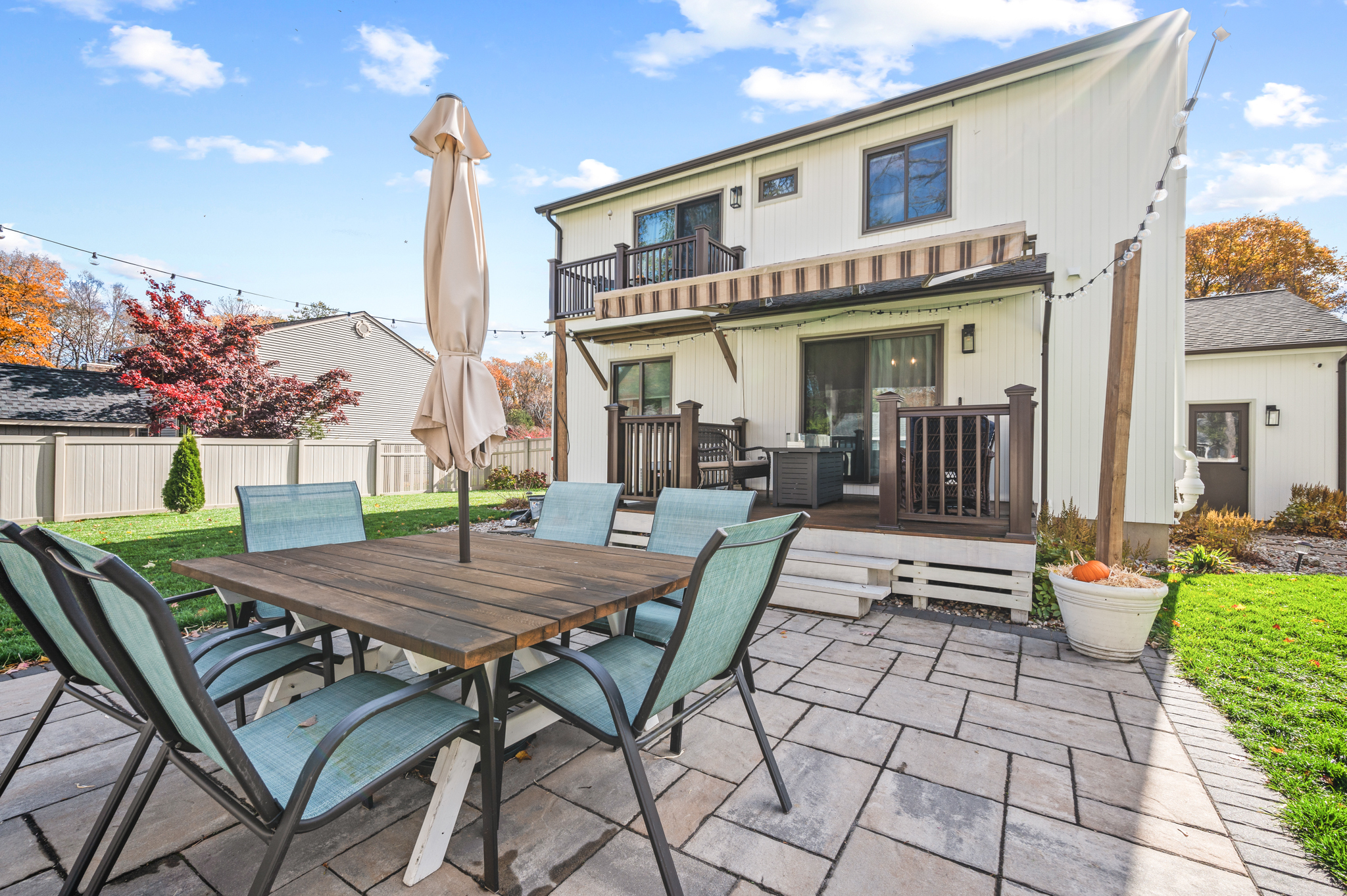 14 Inwood Lane Bristol, CT 06010 - Photo 36 of 40 a view of a patio with table and chairs with wooden floor and fence