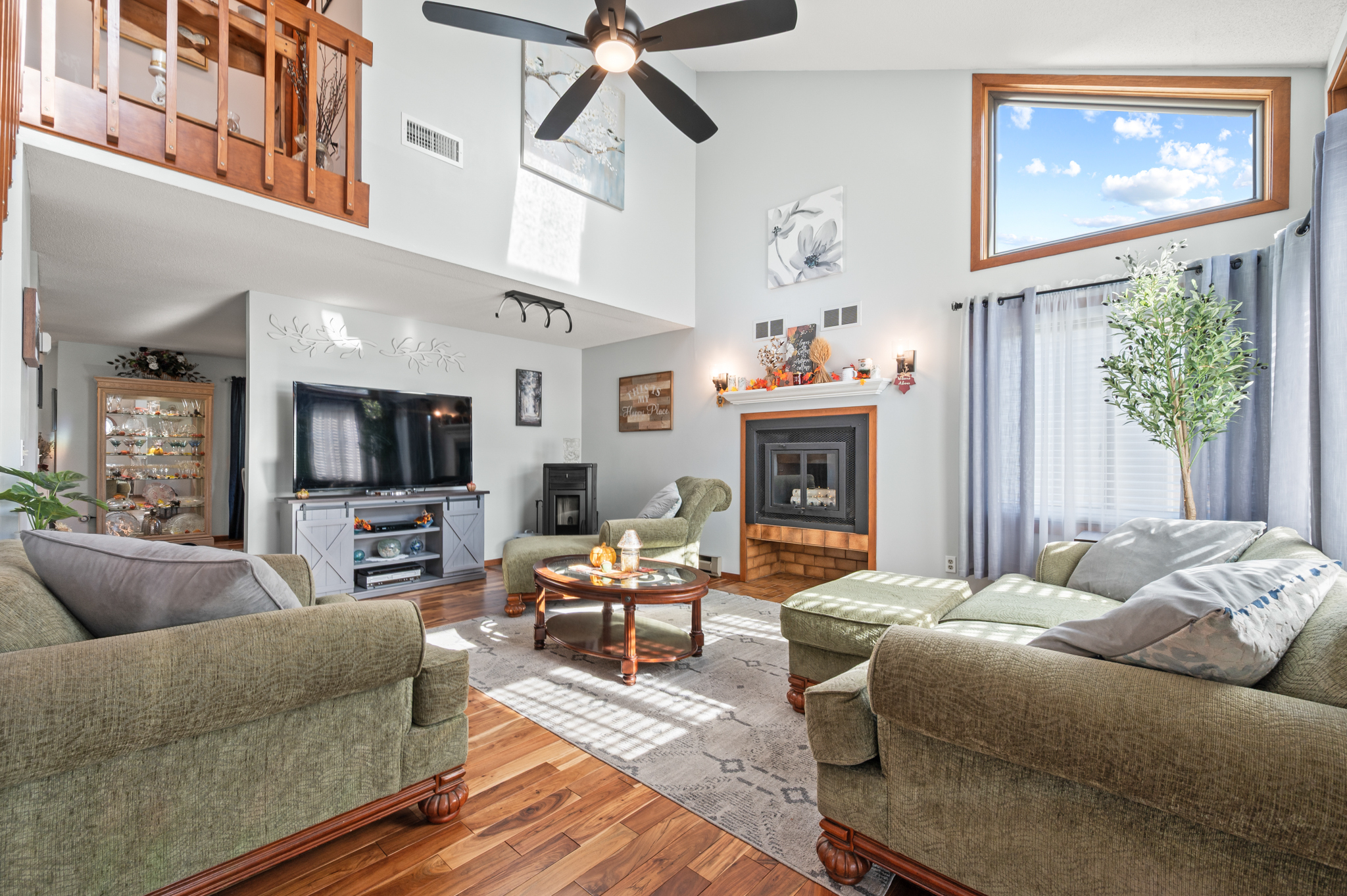 14 Inwood Lane Bristol, CT 06010 - Photo 6 of 40 a living room with furniture a fireplace and a flat screen tv