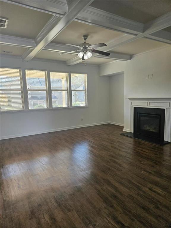 90 Partridge Drive Covington, GA 30016 - Photo 14 of 38 an empty room with wooden floor fireplace and windows