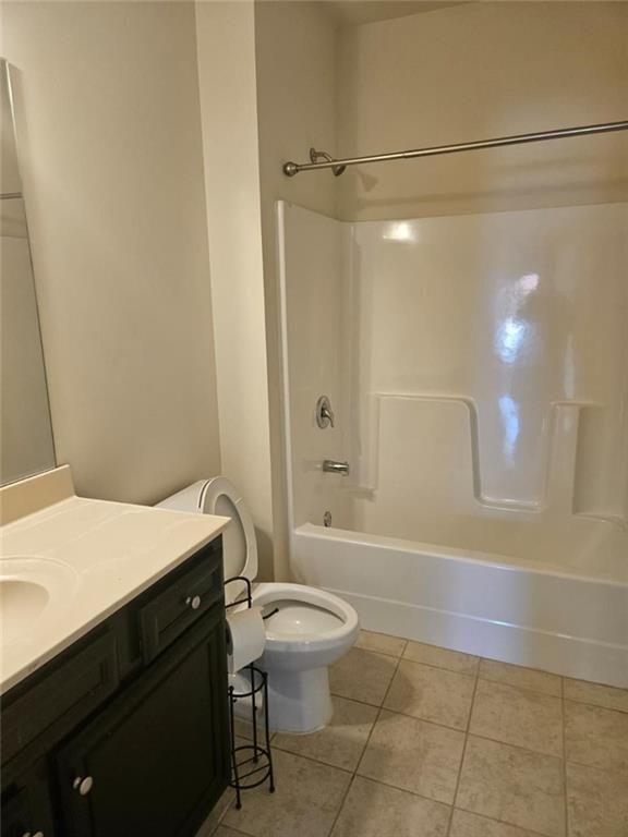 90 Partridge Drive Covington, GA 30016 - Photo 17 of 38 a bathroom with a sink a toilet and shower