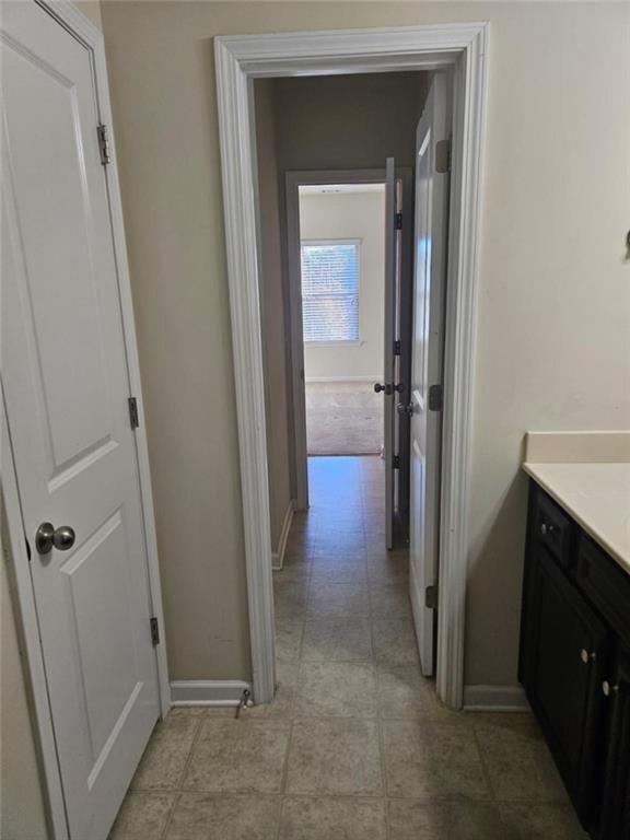90 Partridge Drive Covington, GA 30016 - Photo 22 of 38 a view of a hallway with closet and door