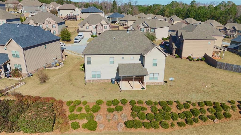90 Partridge Drive Covington, GA 30016 - Photo 35 of 38 an aerial view of a house with swimming pool