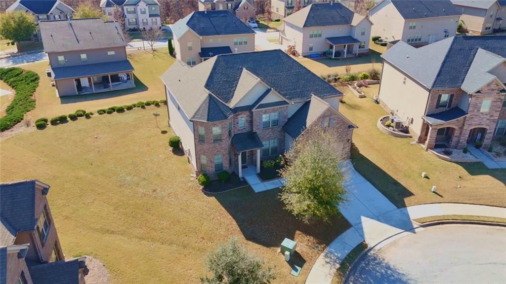 90 Partridge Drive Covington, GA 30016 - Photo 36 of 38 an aerial view of a house with a yard