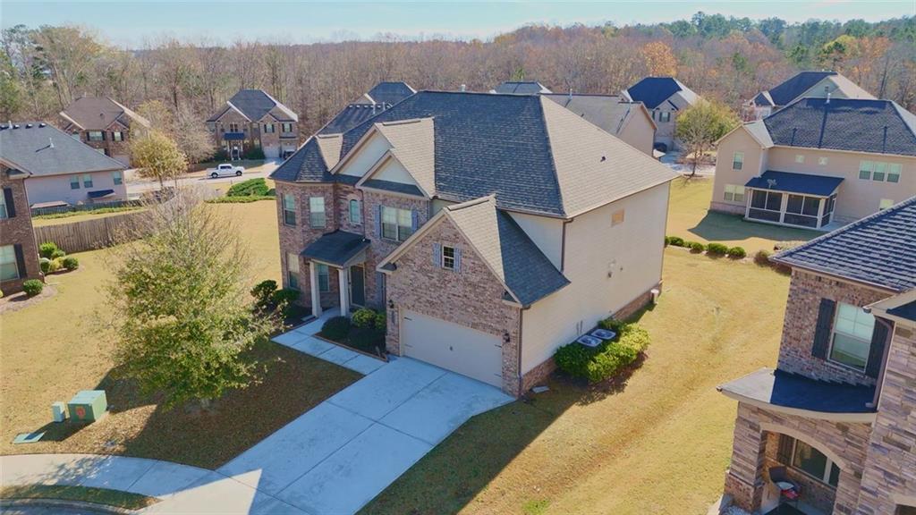 90 Partridge Drive Covington, GA 30016 - Photo 37 of 38 an aerial view of a house with a garden