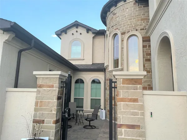 a view of a door house with a glass door