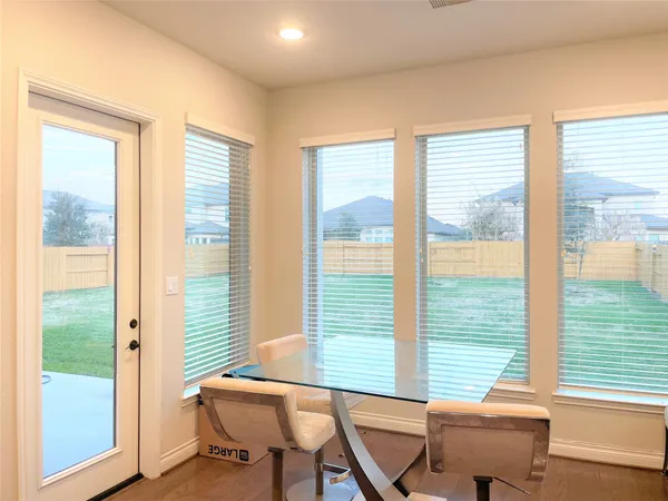 a view of a hallway with staircase