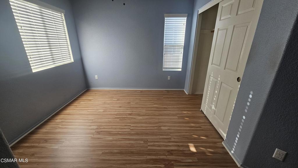 1706 Blazewood Street Simi Valley, CA 93063 - Photo 8 of 13 a view of a room with wooden floor and window