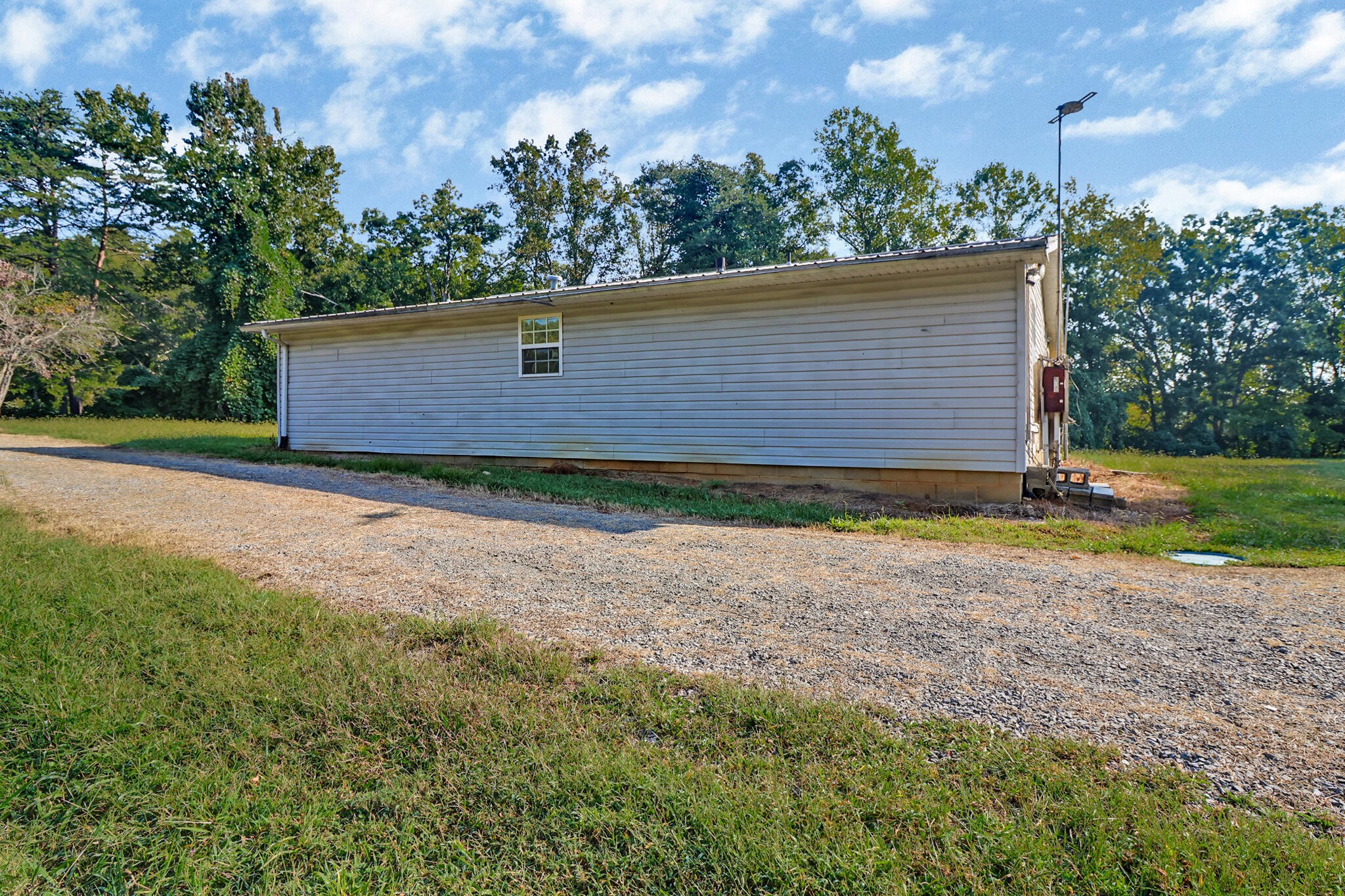3702 Toestring Valley Road Spring City, TN 37381 - Photo 12 of 28 a view of a backyard of a house