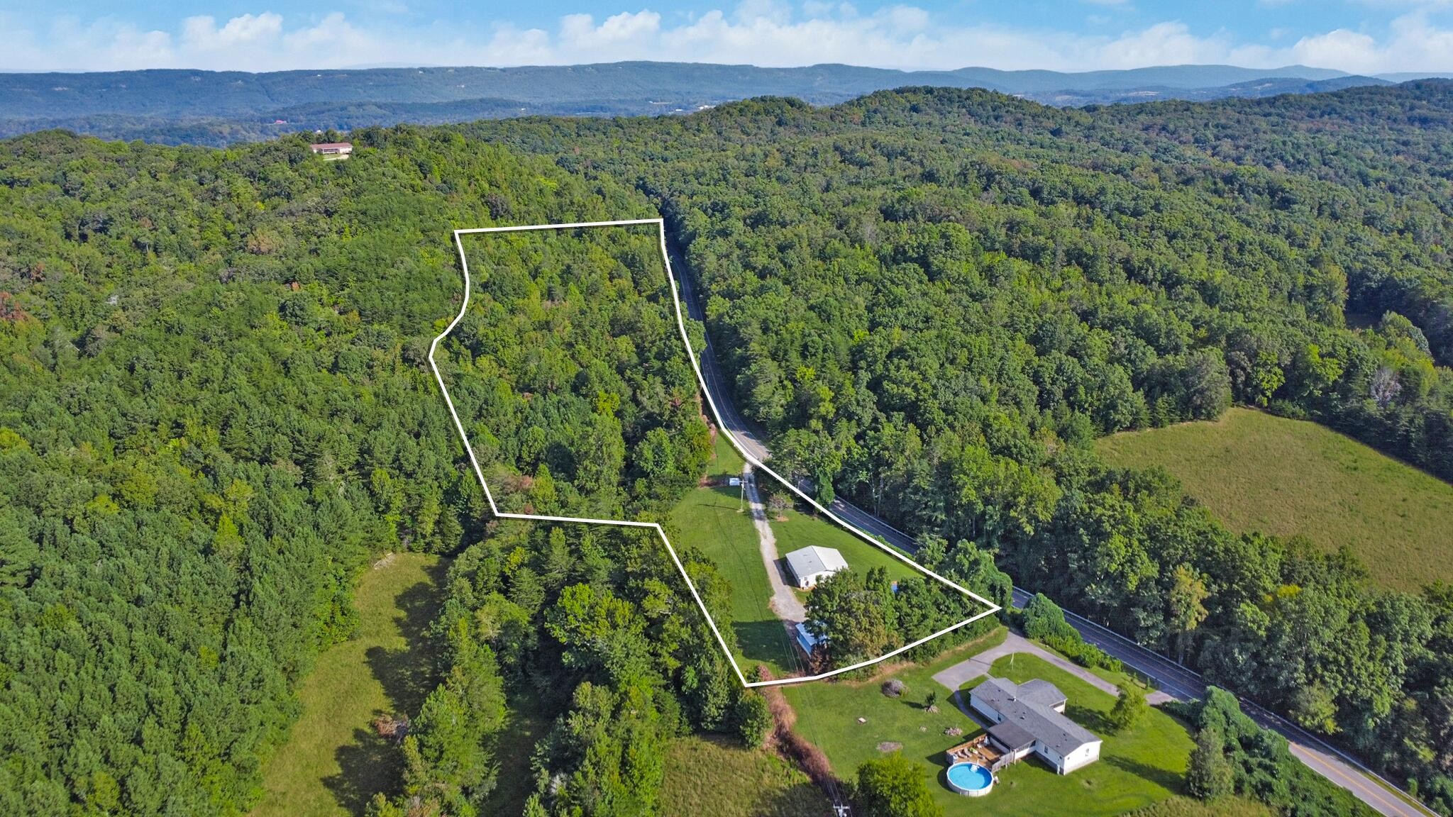 3702 Toestring Valley Road Spring City, TN 37381 - Photo 2 of 28 a view of a tennis court