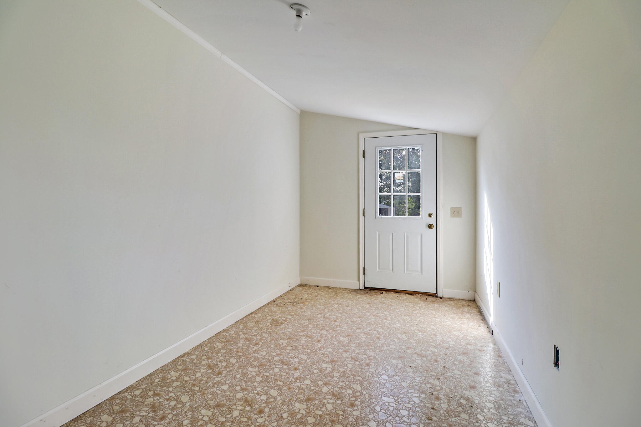3702 Toestring Valley Road Spring City, TN 37381 - Photo 24 of 28 a view of an empty room with wooden floor and a window