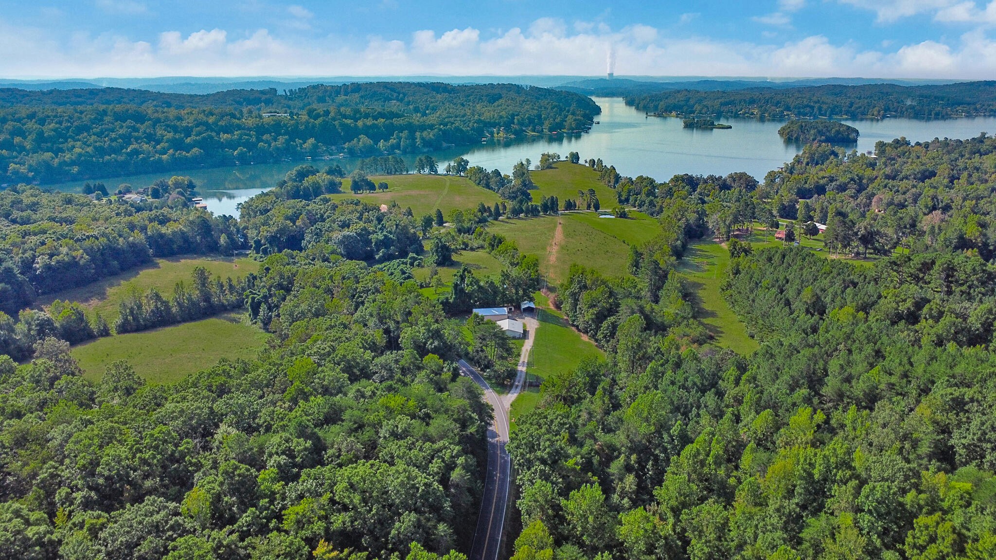 3702 Toestring Valley Road Spring City, TN 37381 - Photo 8 of 28 a view of a lake with a city