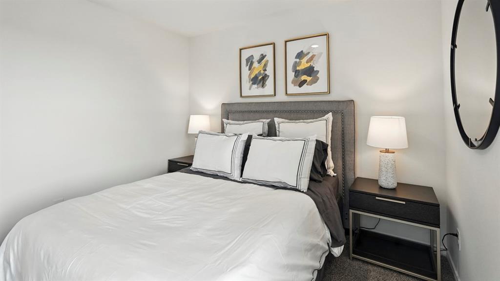 2640 Gladewater Road Celina, TX 75009 - Photo 15 of 40 a bedroom with a bed and painting on the wall